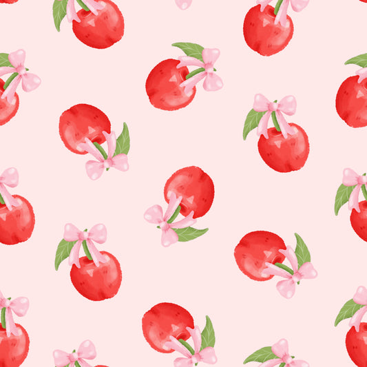 Pattern of red cherries with pink bows on a light pink background