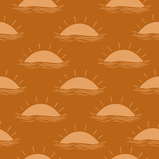 Pattern of sun and wave design on a brown background